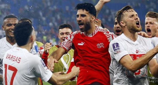 Switzerland through, Cameroon fall short